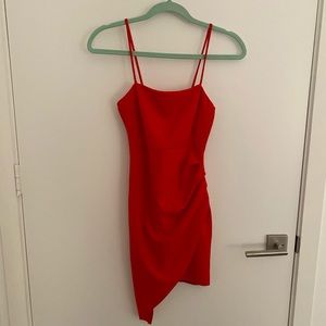 Red asymmetrical dress.